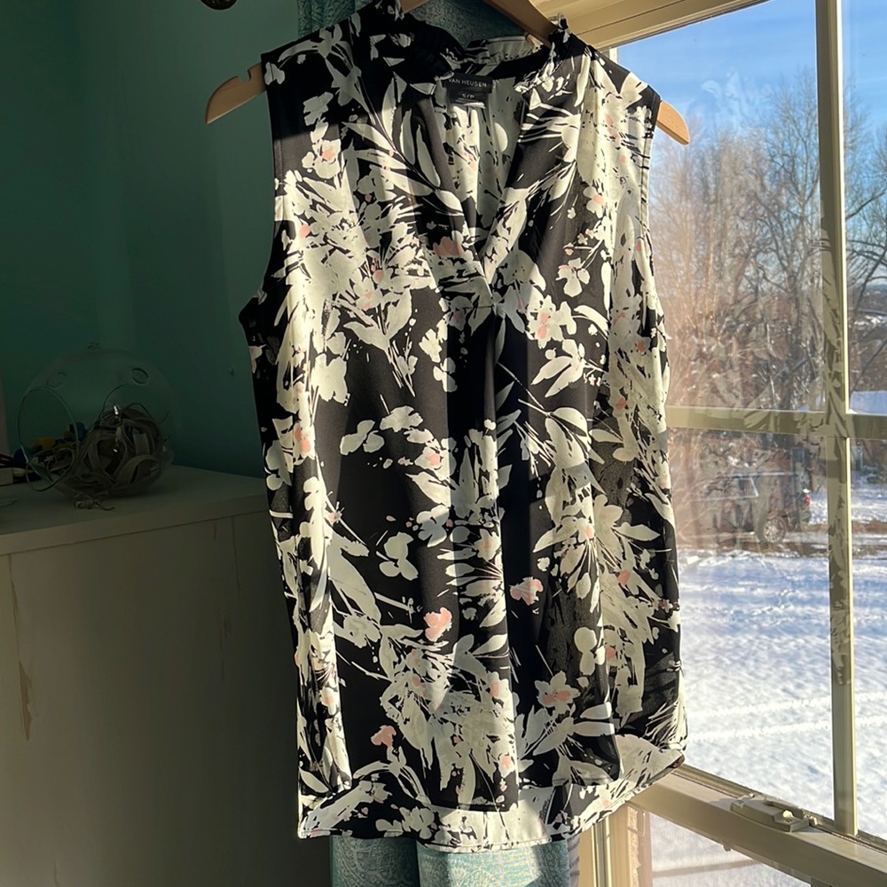 sleeveless, v-neck, black blouse with white flowers and pink splotches